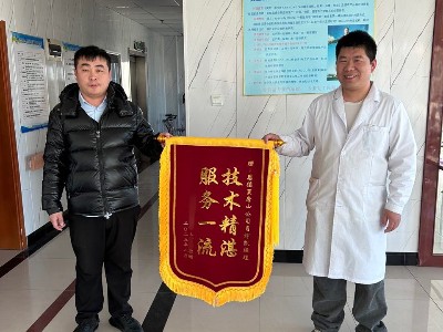 錦旗飄揚，恩德萊唐山公司的溫暖回響