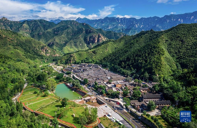 河北省阜平縣駱駝灣村景色(2021年7月23日攝，無人機照片)；新華社記者朱旭東攝